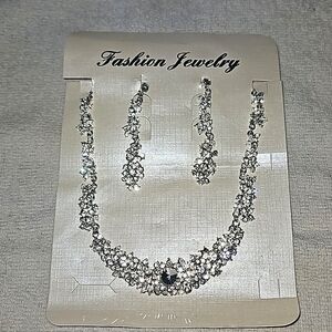 Women's fashion jewelry, dangling earrings and necklace